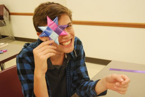 Senior Jacob Taylor proudly poses with his star after struggling to create one. 