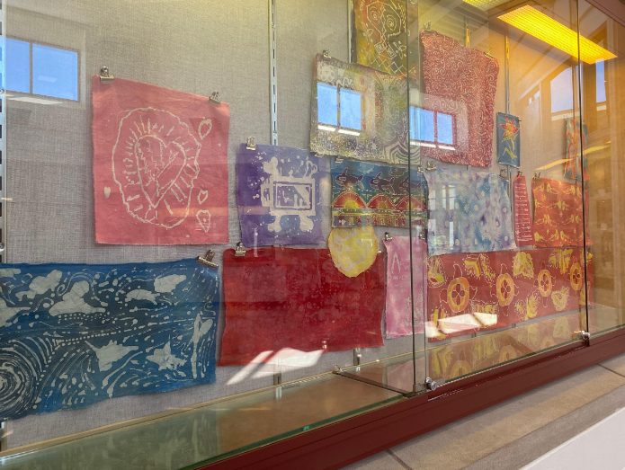 Fiber arts students now have some of their batik projects, a newly introduced project in the BHSN fiber arts classroom, on display in the art display cases.