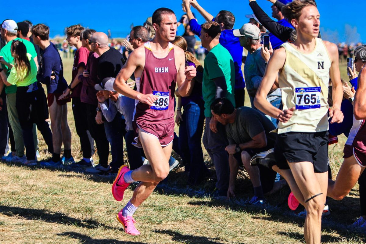 Caelan D'Onofrio pushes hard at the state meet and finishes 13th overall.